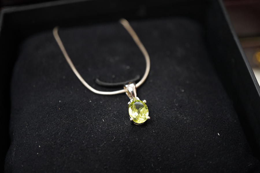 A collection of silver and other costume jewellery, including a diamond cluster ring in 9ct gold, size M, British hallmarks; a citrine ring in 9ct gold, size O, British hallmarks; a citrine ring in low carat gold, size N